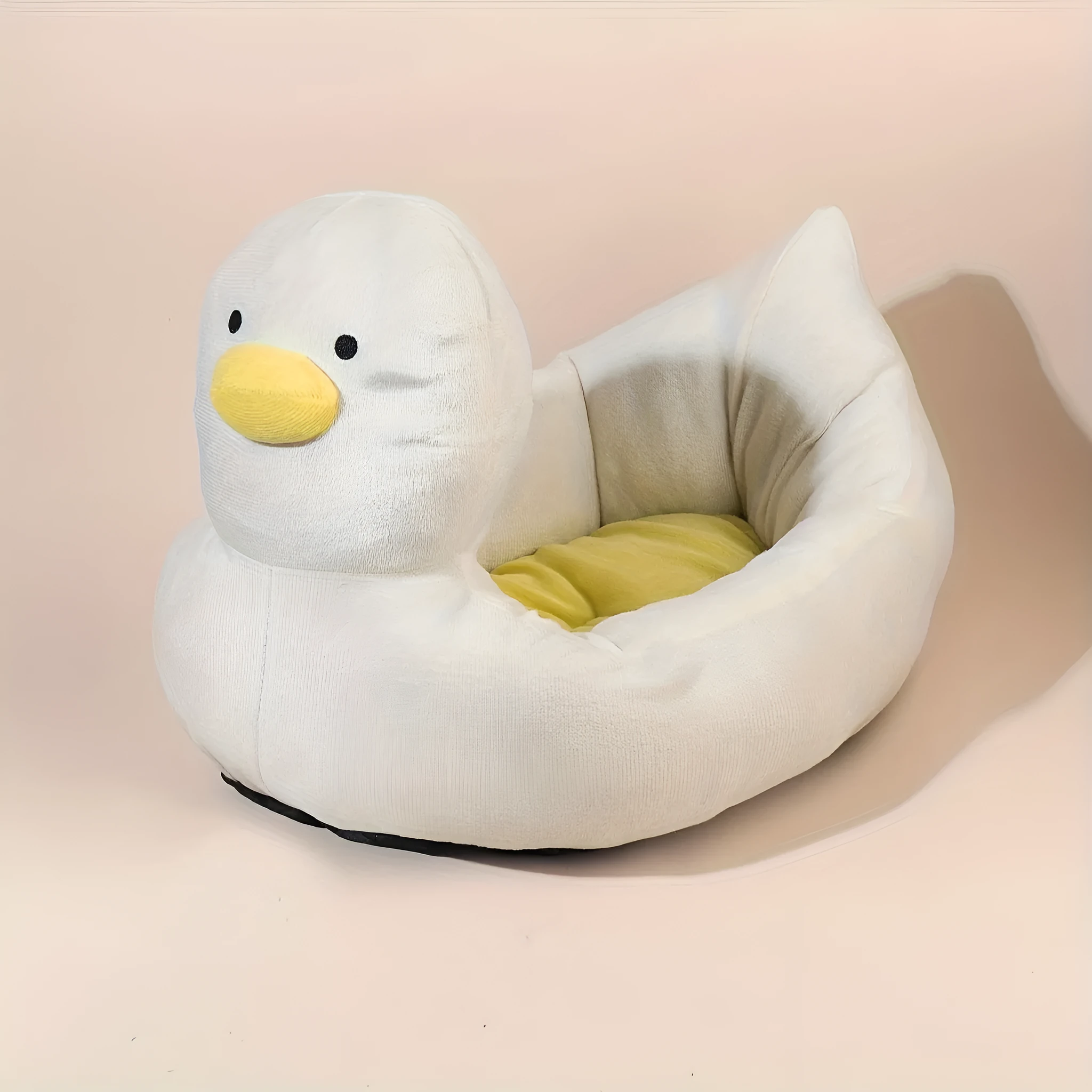 Blue duck-shaped fluffy pet bed for small dogs and cats on a wooden floor.