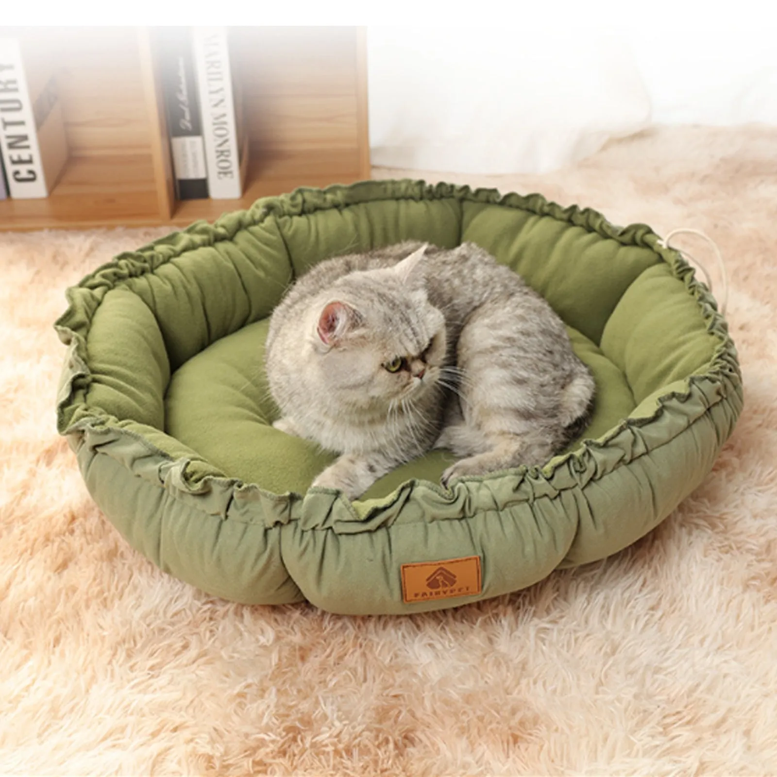Grey reversible donut pet bed with raised bolster edge for cats or small dogs