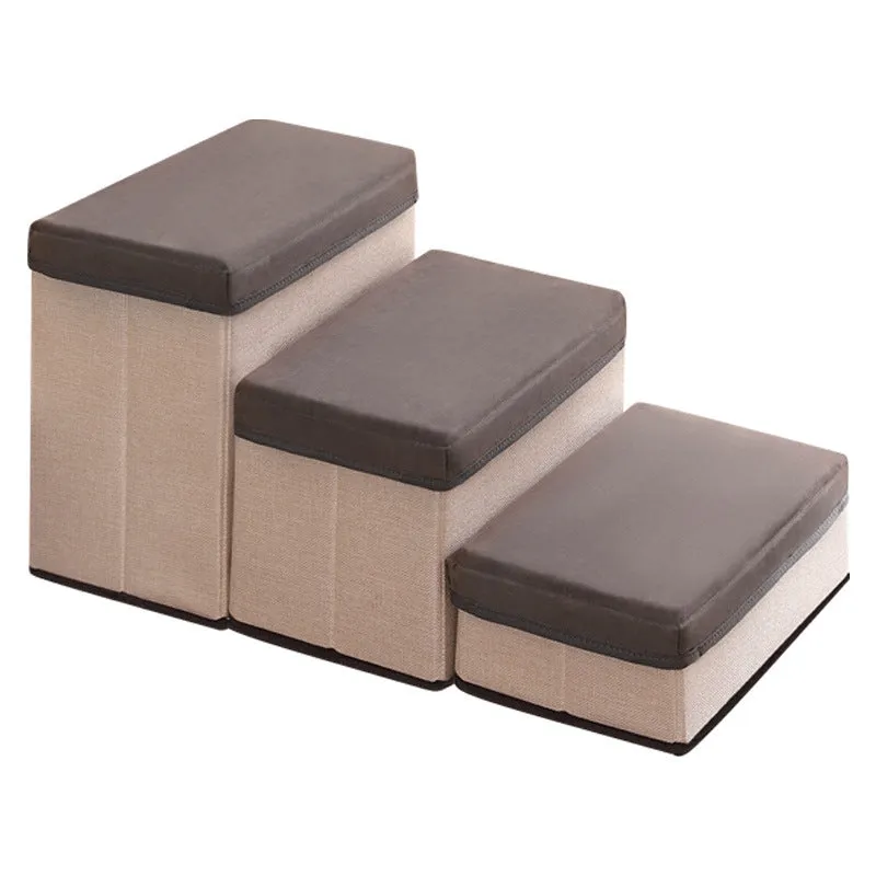 Brown foldable pet stairs steps for dogs with non-slip cloth surface on a floor