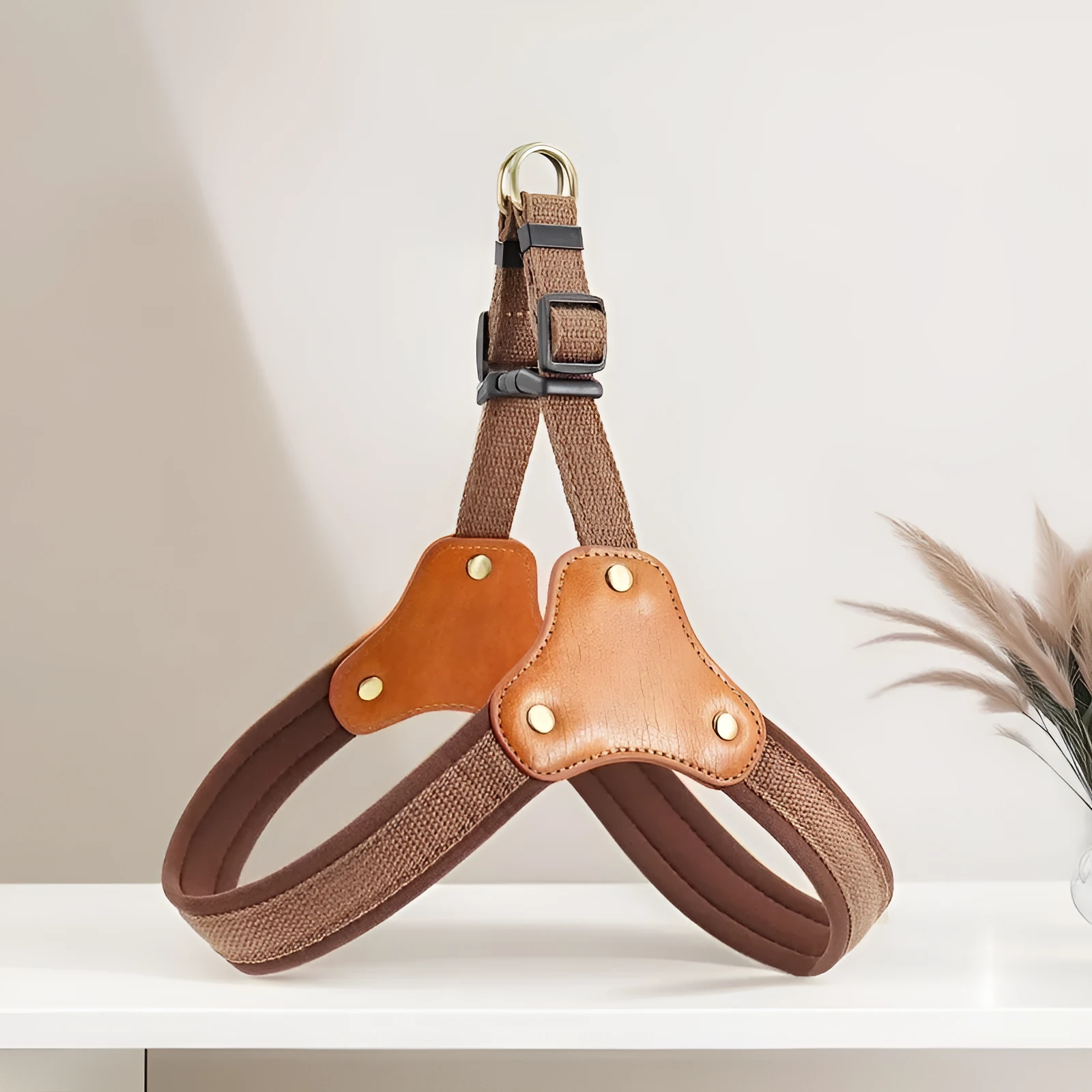 Dog breast collar with hand holding rope in cloth for small dogs and cats, shown in brown colour