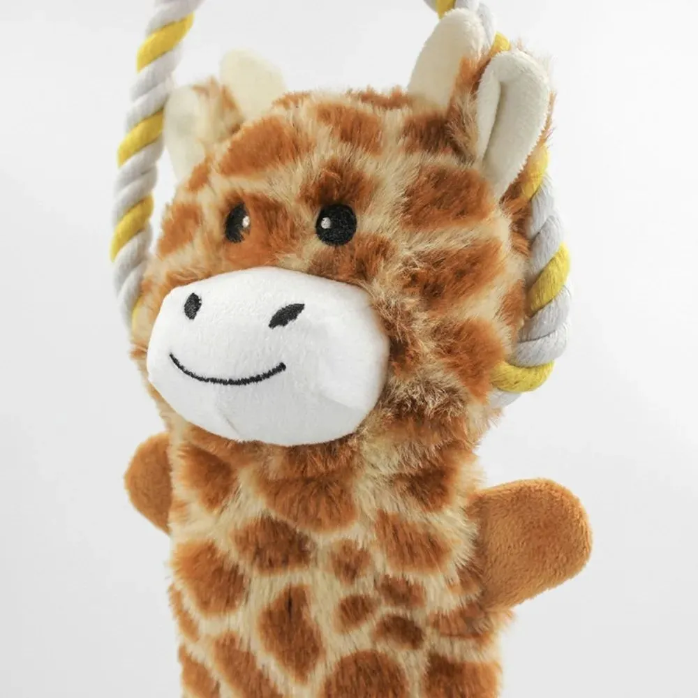 Plush dog toy shaped like zebra with rope and squeaker on white background
