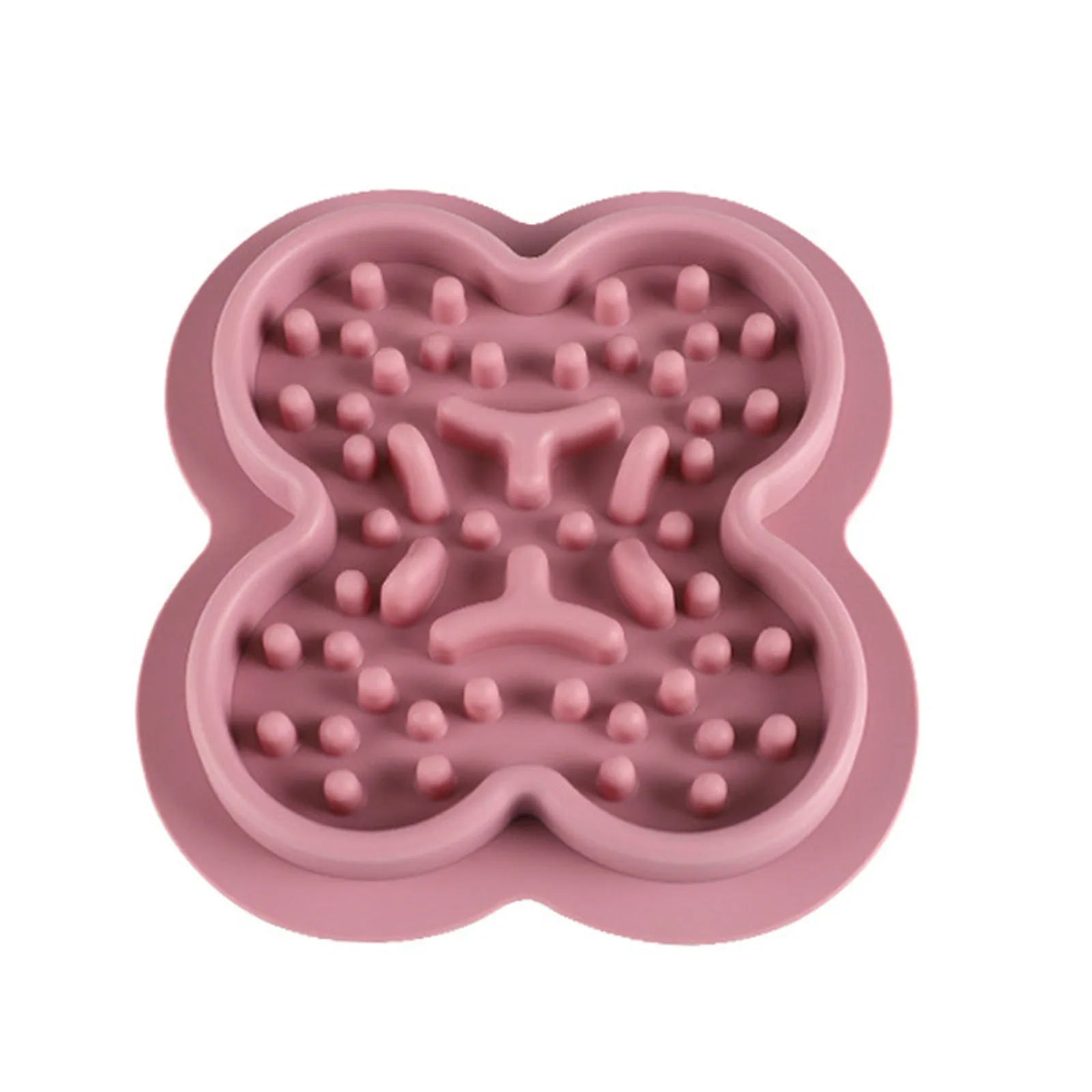 Silicone slow feed licking pad for cats and dogs on a floor, showing textured surface and raised edge.