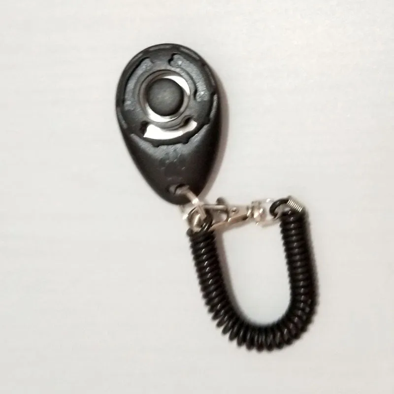 Dog training clicker in multiple colours with wrist strap for positive reinforcement training
