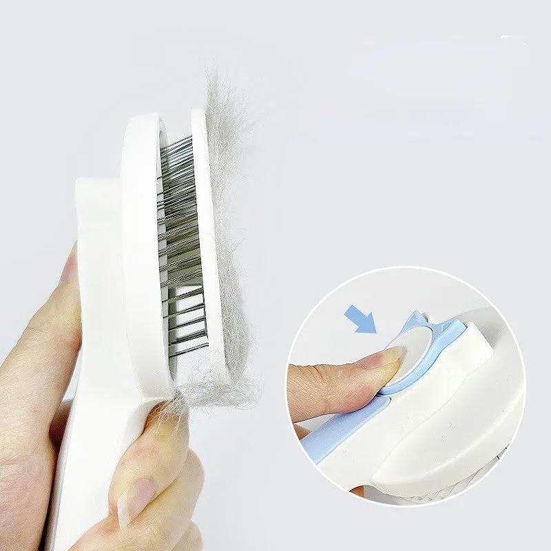Self-cleaning pet grooming brush with stainless steel bristles and round massage beads for dogs and cats