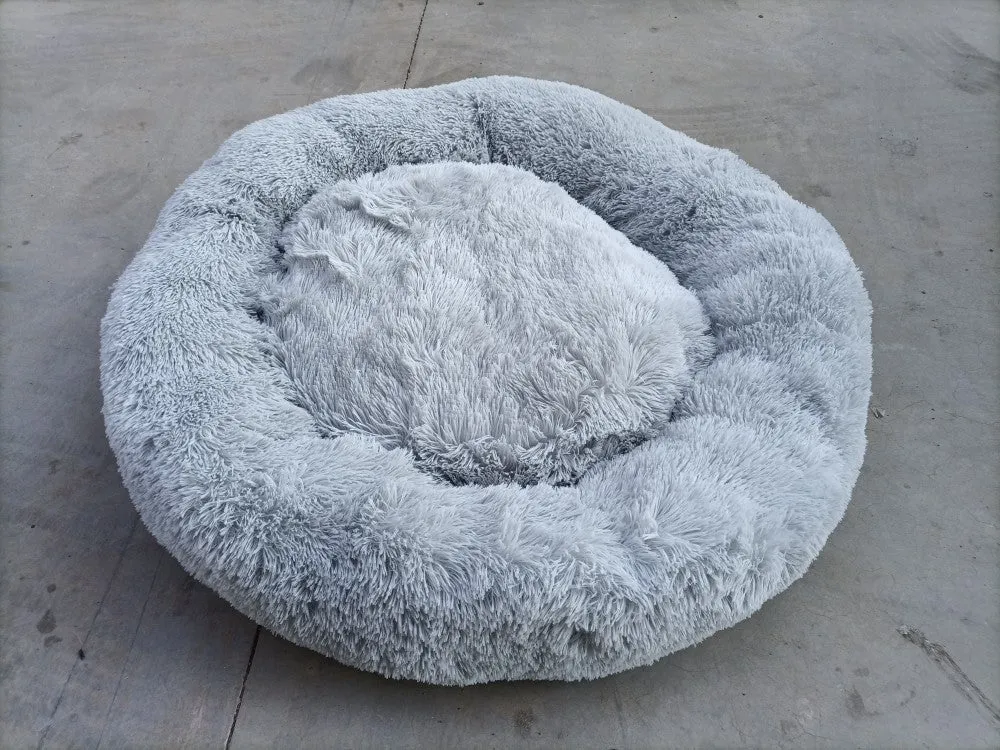Pet sleep bed with anti-skid bottom and soft plush surface in beige