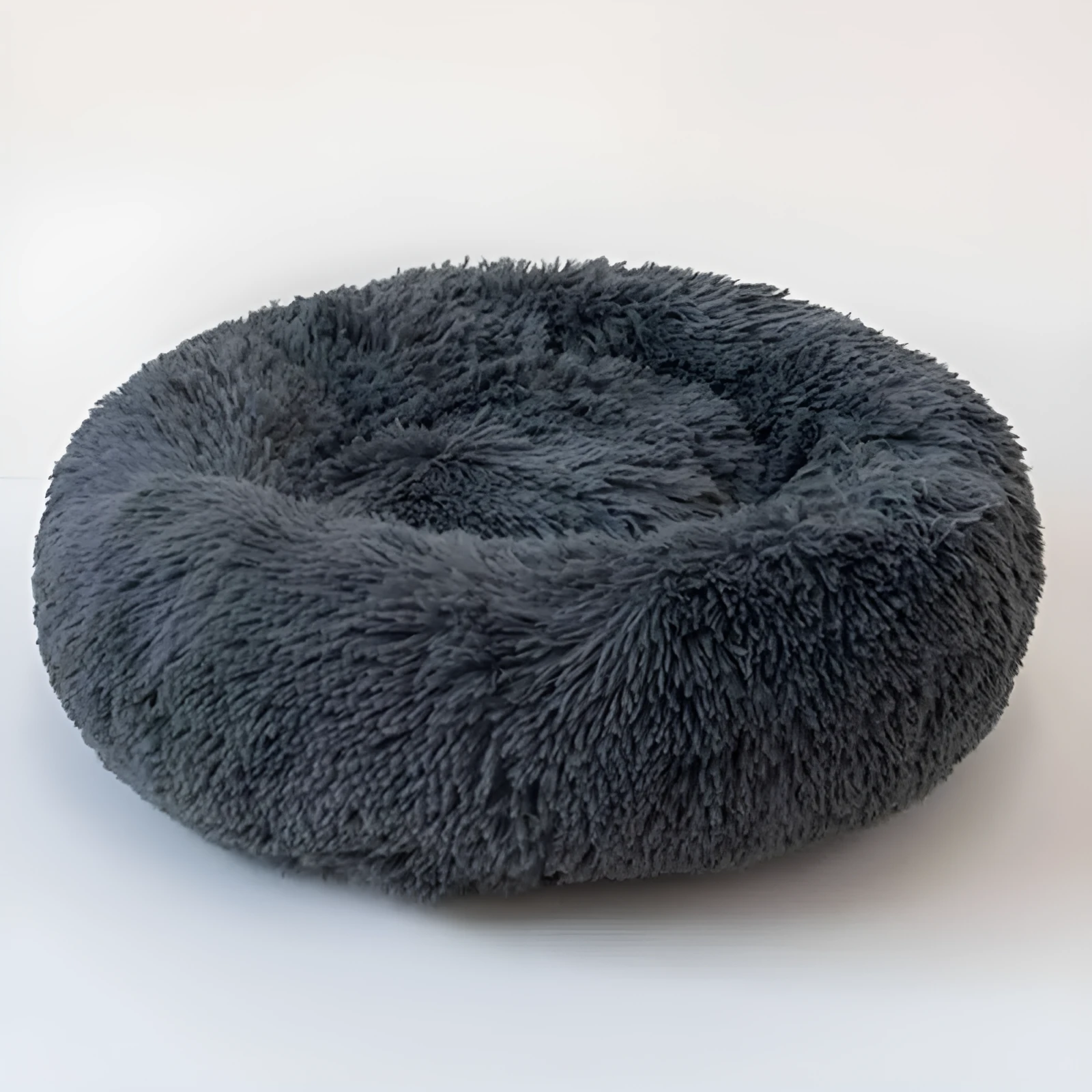 Pet sleep bed with anti-skid bottom and soft plush surface in beige