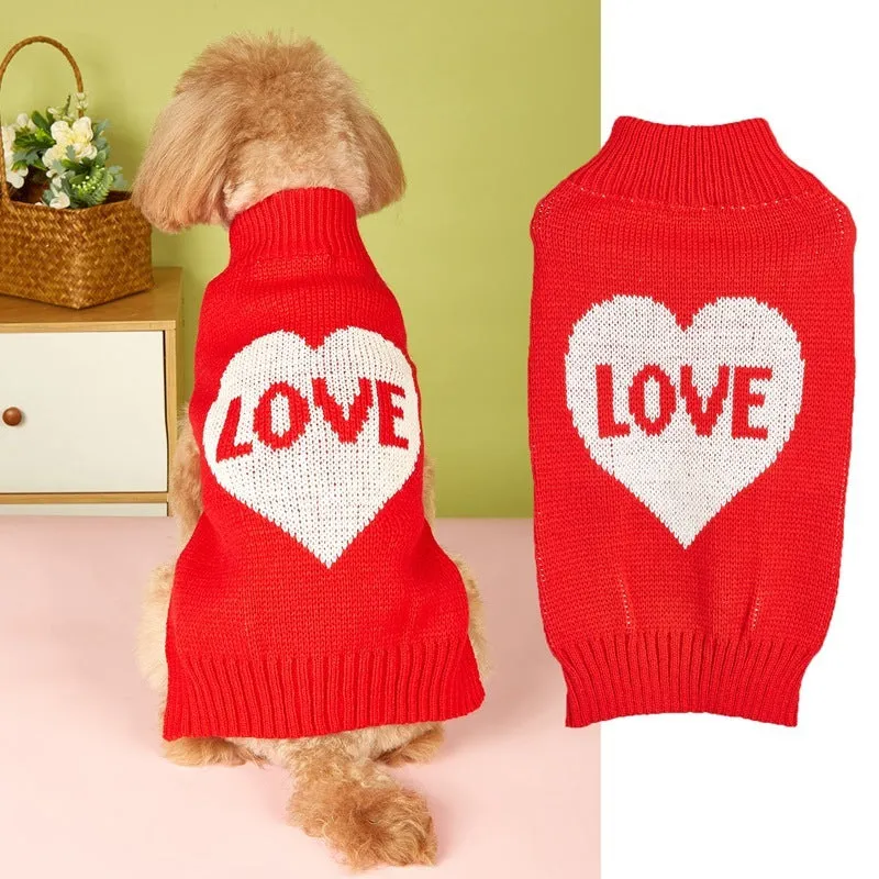 Dog wearing acrylic jumper with decorative heart or bow design in pink or red colours