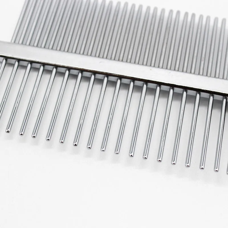 Double-row pet grooming comb with red handle and stainless steel needles on white background
