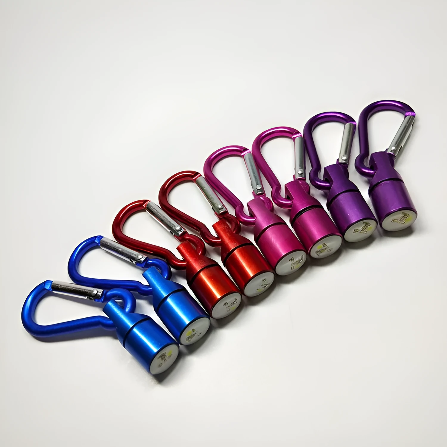 LED pet light in silver with copper alloy body showing 60mm length and 12mm width on a dog collar
