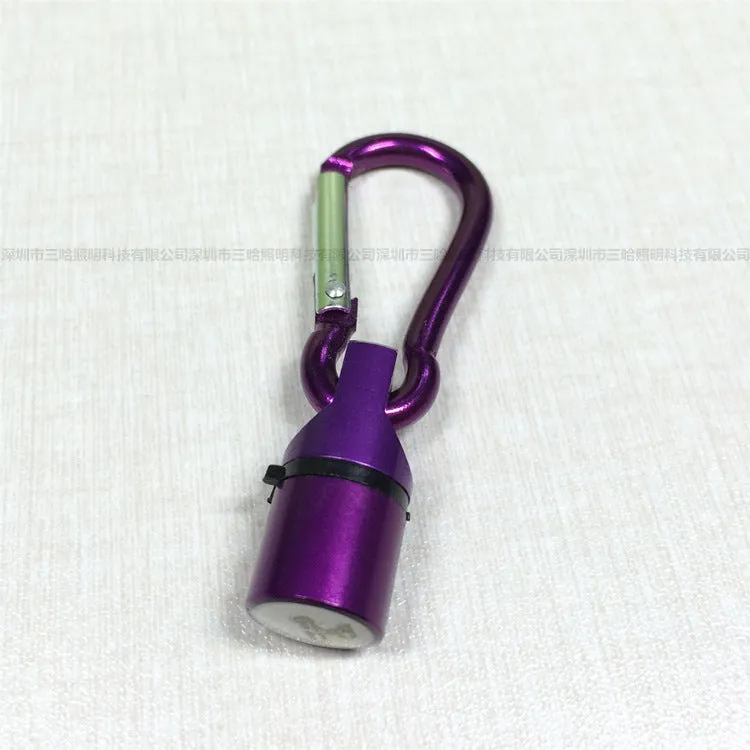 LED pet light in silver with copper alloy body showing 60mm length and 12mm width on a dog collar