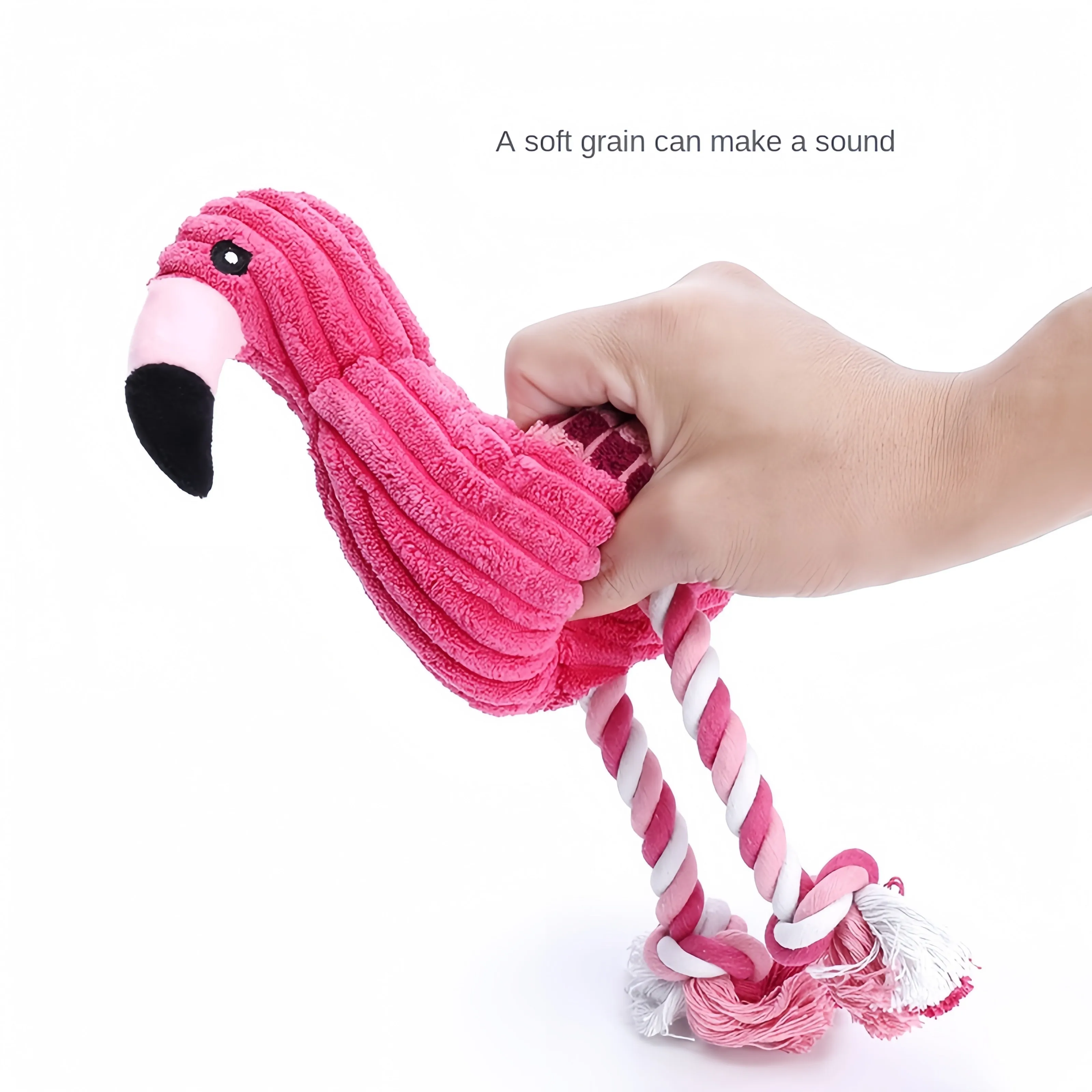 Pink animal-shaped corduroy plush dog toy with squeaker