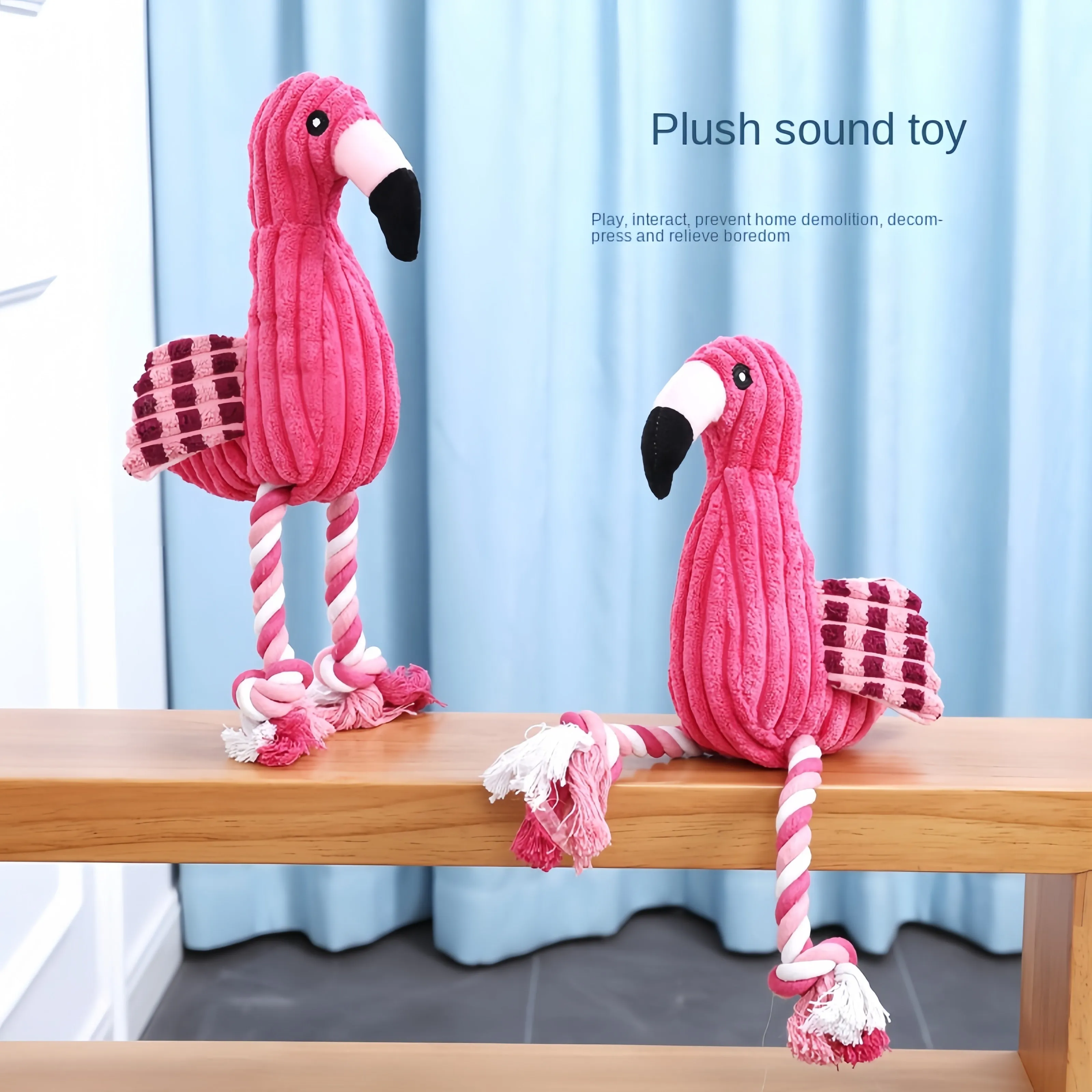 Pink animal-shaped corduroy plush dog toy with squeaker