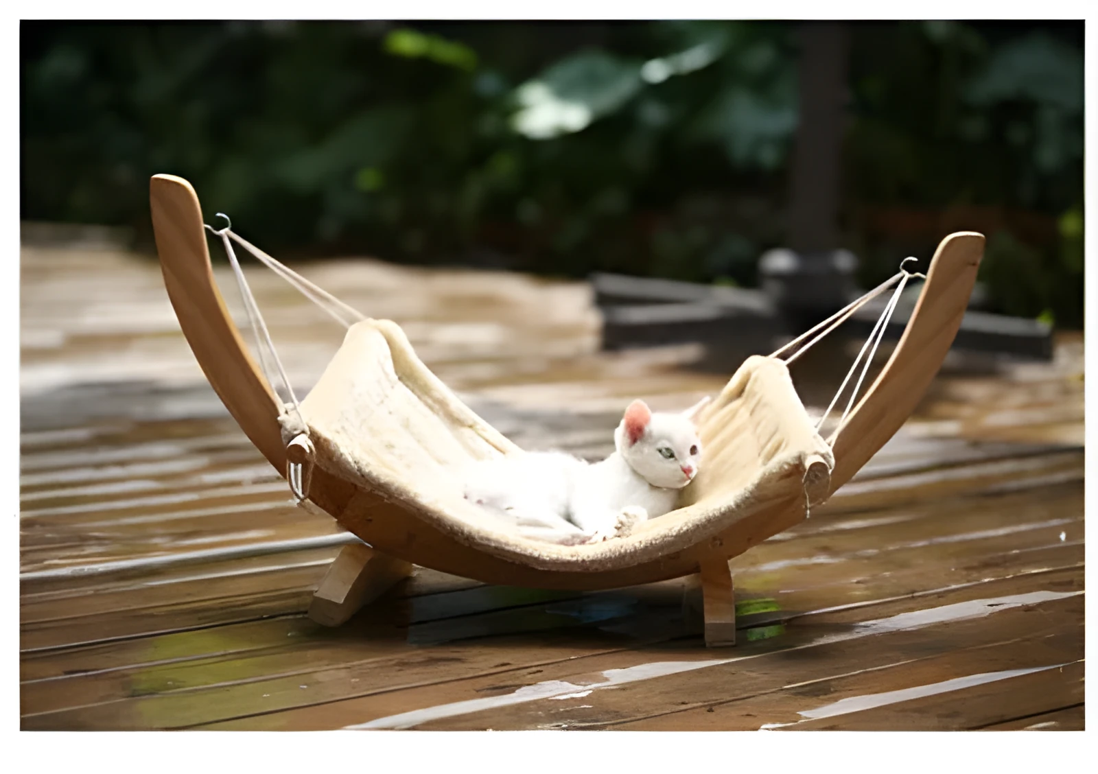 Cat hammock wooden bed with beige removable cushion on a radiator, providing a cosy perch for cats.