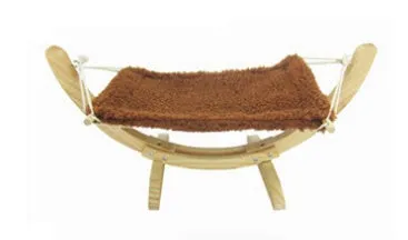 Cat hammock wooden bed with beige removable cushion on a radiator, providing a cosy perch for cats.