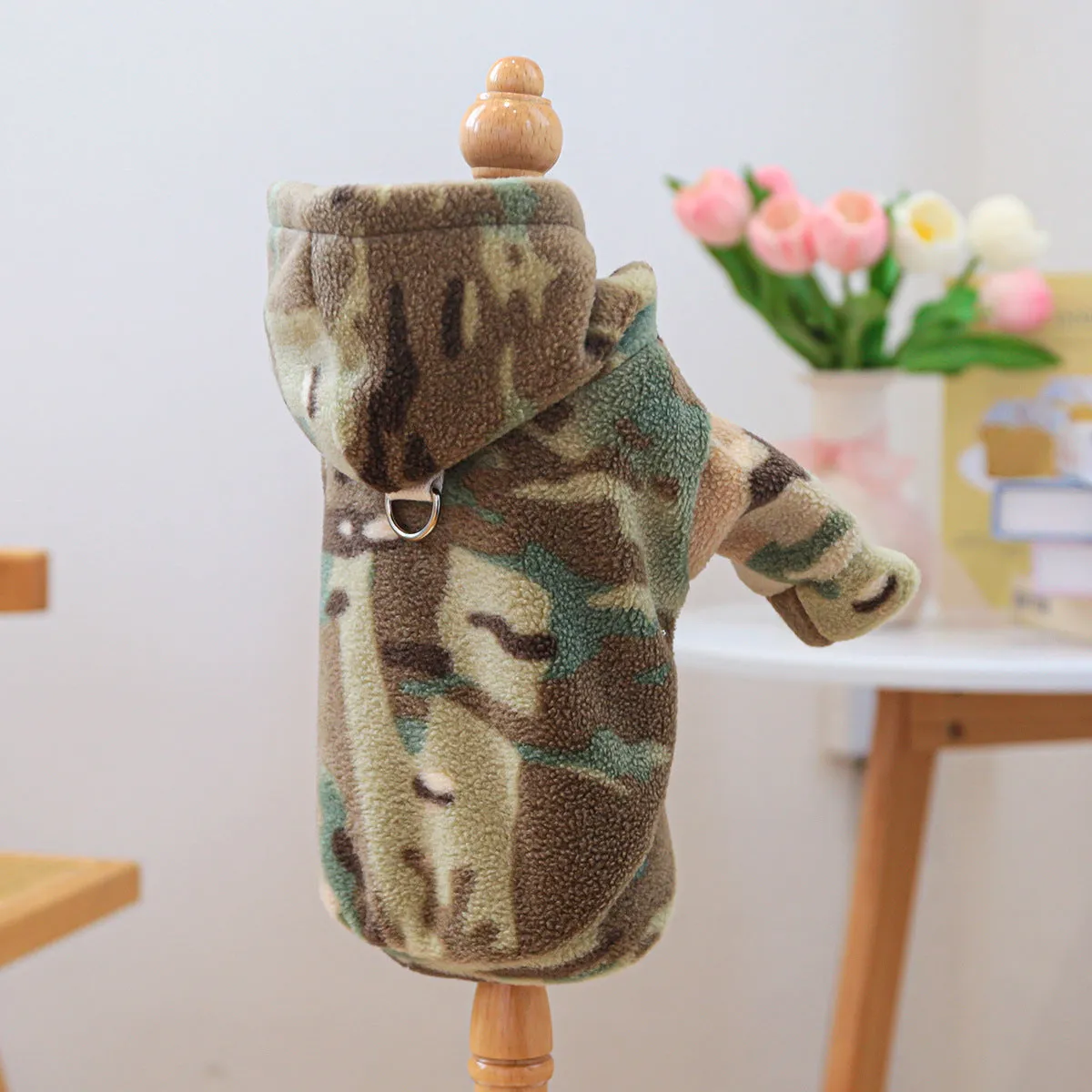 Camouflage polyester dog sweater on display, available in sizes XS to XL for dogs up to 9kg
