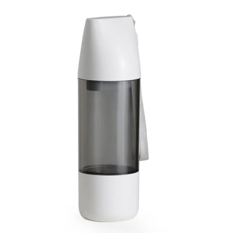 Portable dog water bottle with white food-grade ABS body and separate water and grain compartments