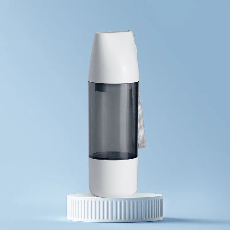 Portable dog water bottle with white food-grade ABS body and separate water and grain compartments