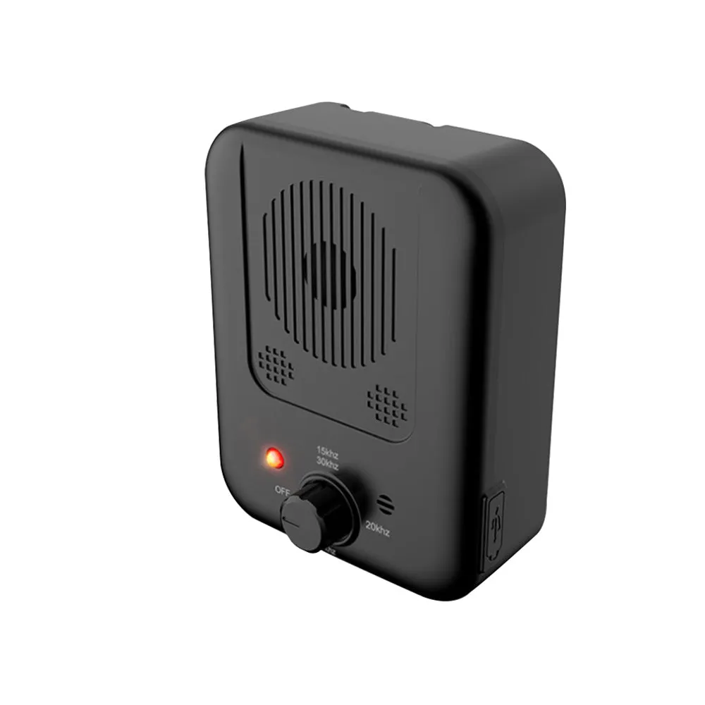 Ultrasonic anti barking device mounted on wooden fence with dog in background, 50-foot detection range