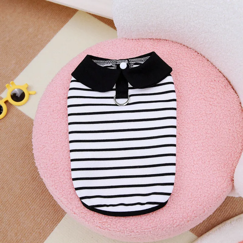 A dog wearing a striped cotton t-shirt and matching skirt summer outfit set.