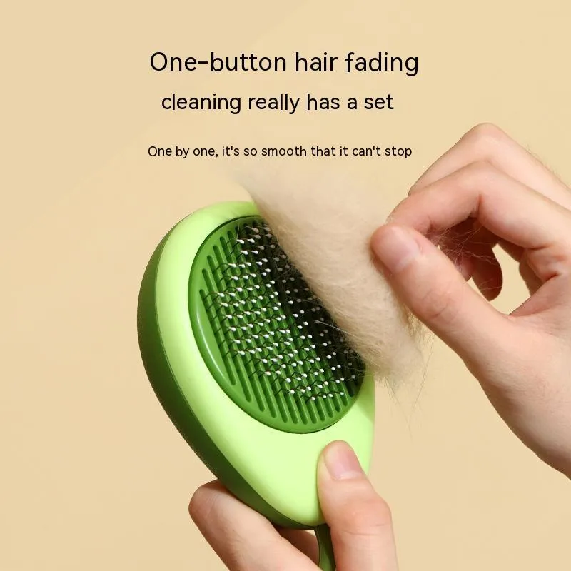 Avocado-shaped cat brush in avocado green with stainless steel needles