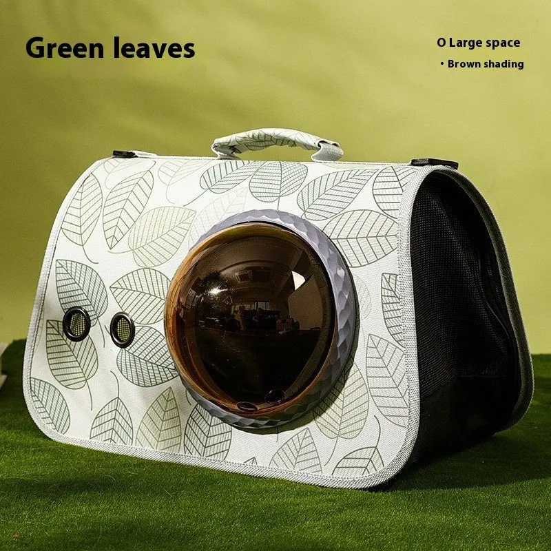 Cat travel bag with transparent space cover, crossbody strap, and cartoon pattern in green leaves design