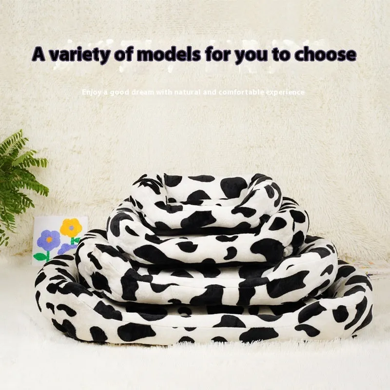 Four Seasons universal kennel dog bed in cow colour cloth, available in sizes S to XL from 30 to 85 cm