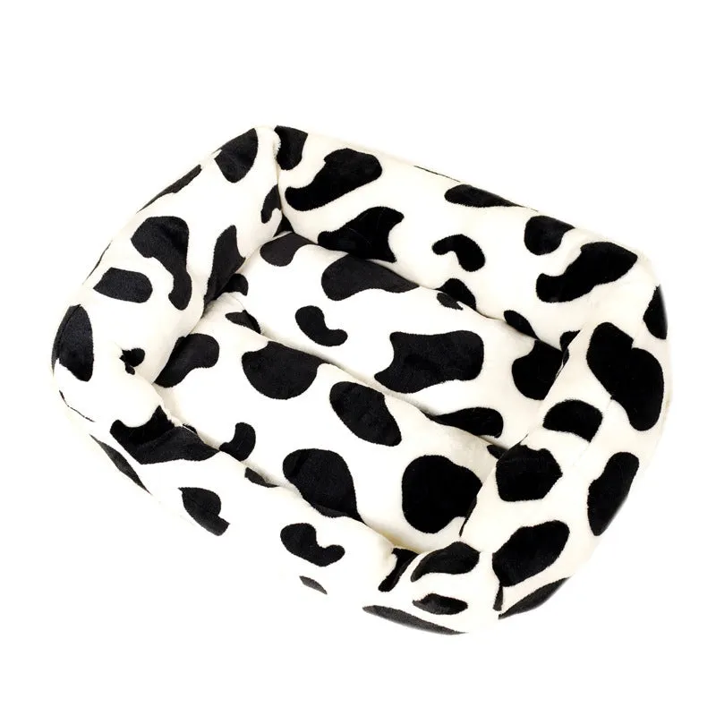 Four Seasons universal kennel dog bed in cow colour cloth, available in sizes S to XL from 30 to 85 cm