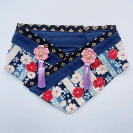 Japanese style pet scarf bib with red diamond pattern and tassels on a light background