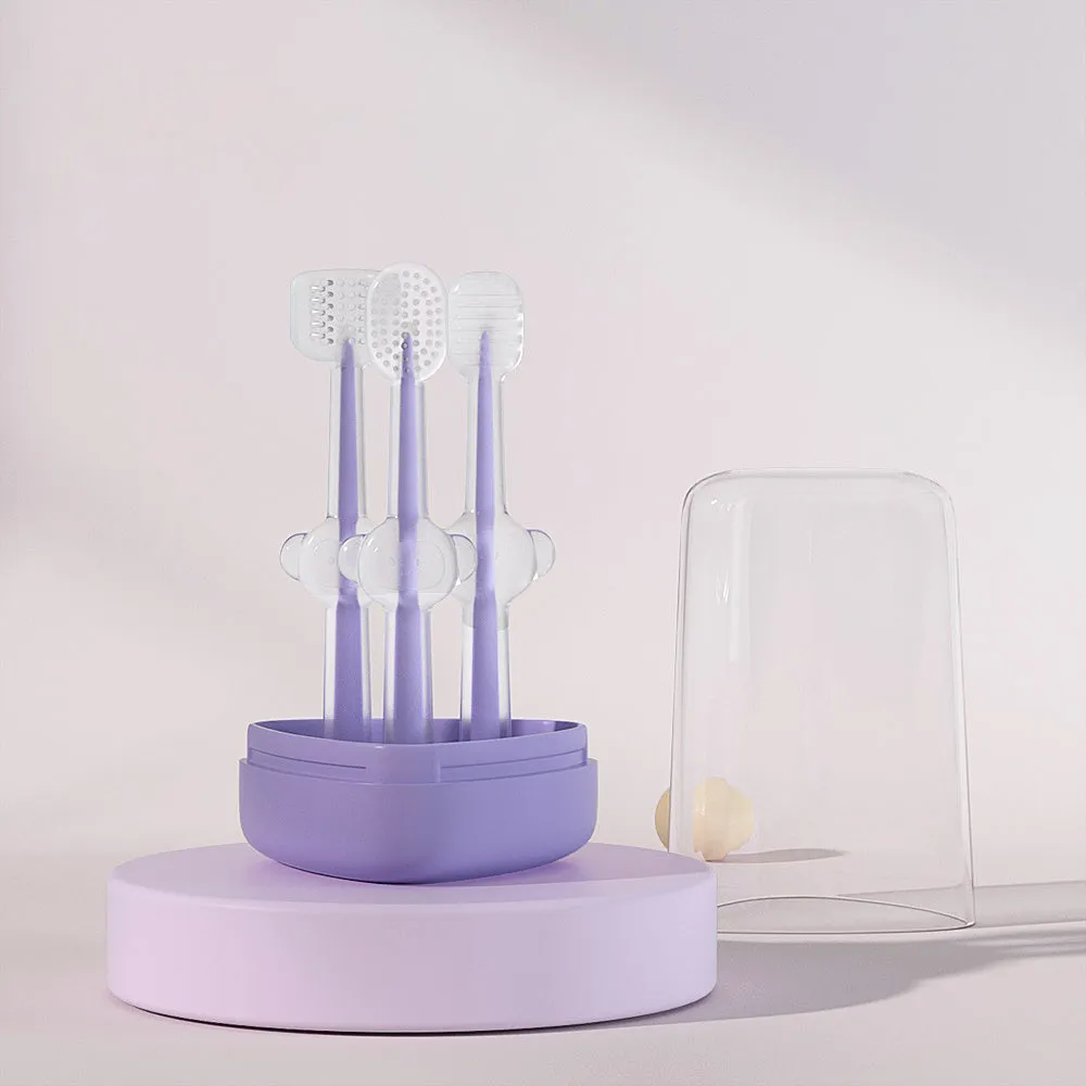 Blue, green, and purple pet toothbrushes with soft silicone bristle heads for dogs and cats.