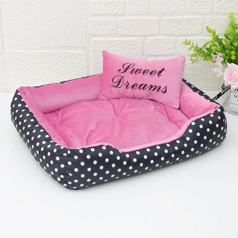Polka dot print square nest dog bed with matching embroidered cushion in grey, blue, pink, or red.