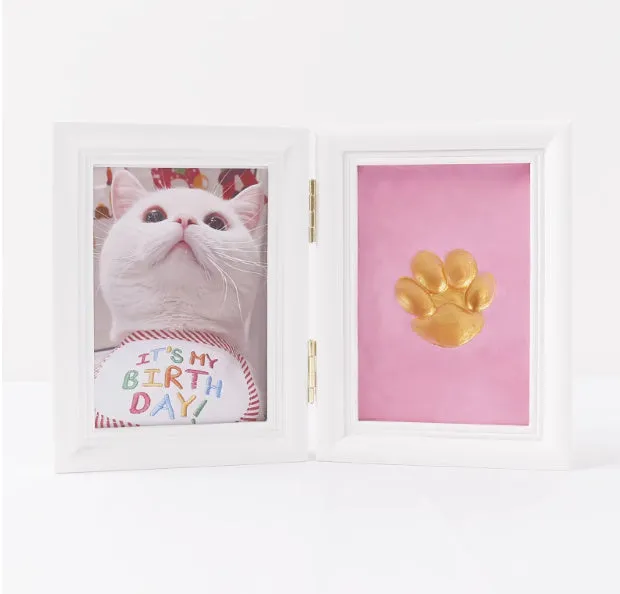 Solid wood cat palm print photo frame with gold lacquer and seal paste kit on table