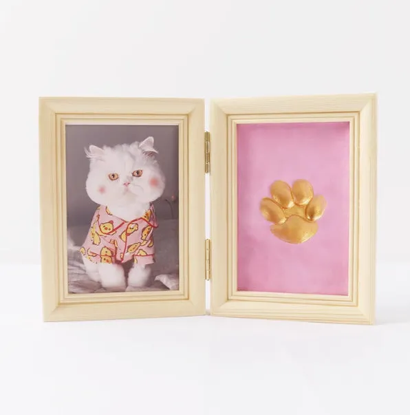 Solid wood cat palm print photo frame with gold lacquer and seal paste kit on table