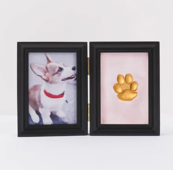 Solid wood cat palm print photo frame with gold lacquer and seal paste kit on table