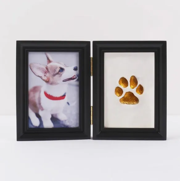 Solid wood cat palm print photo frame with gold lacquer and seal paste kit on table
