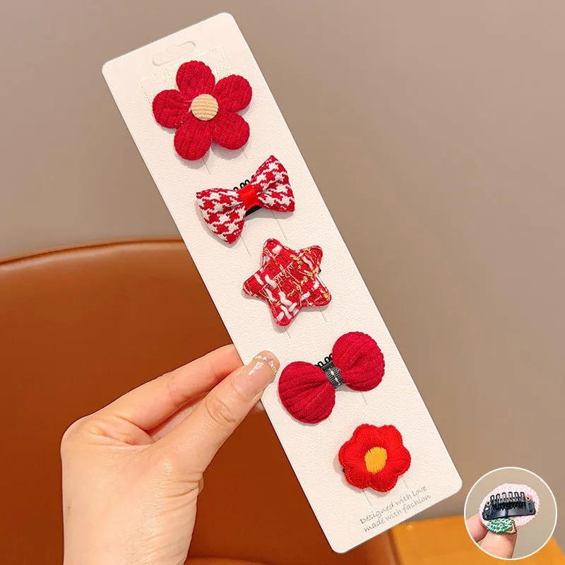 Red and pink plaid plastic cartoon mini dog hairpin sets on a light background