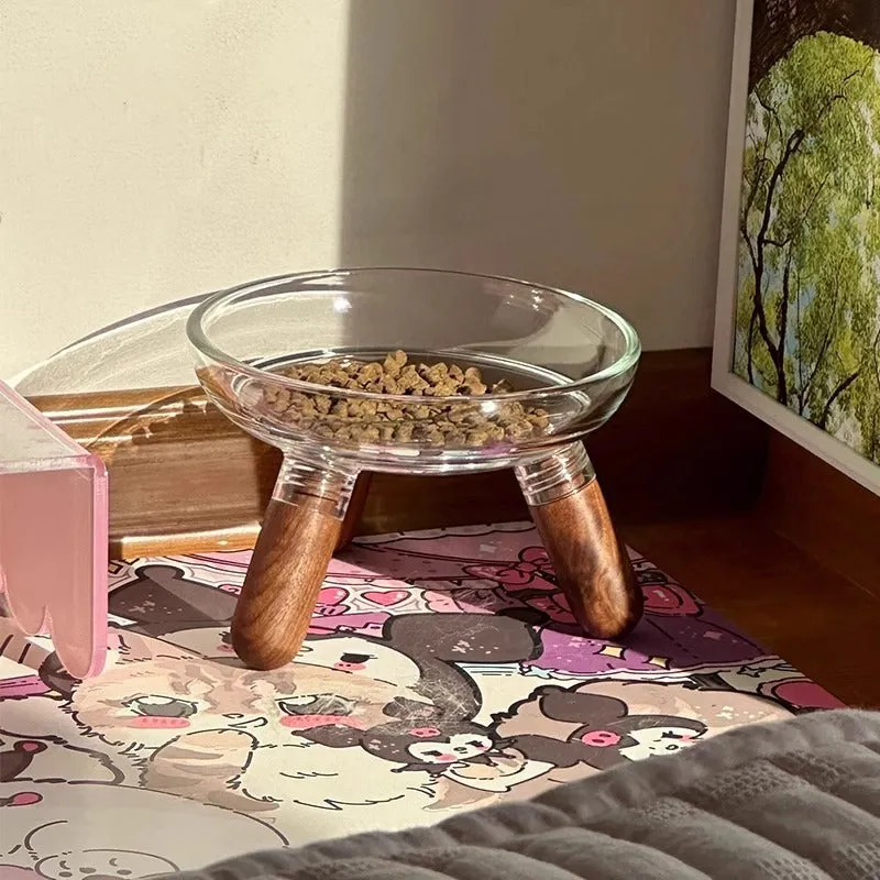 Pet bowl stand with glass bowl on light-coloured plastic shelf for cervical protection suitable for cats and dogs