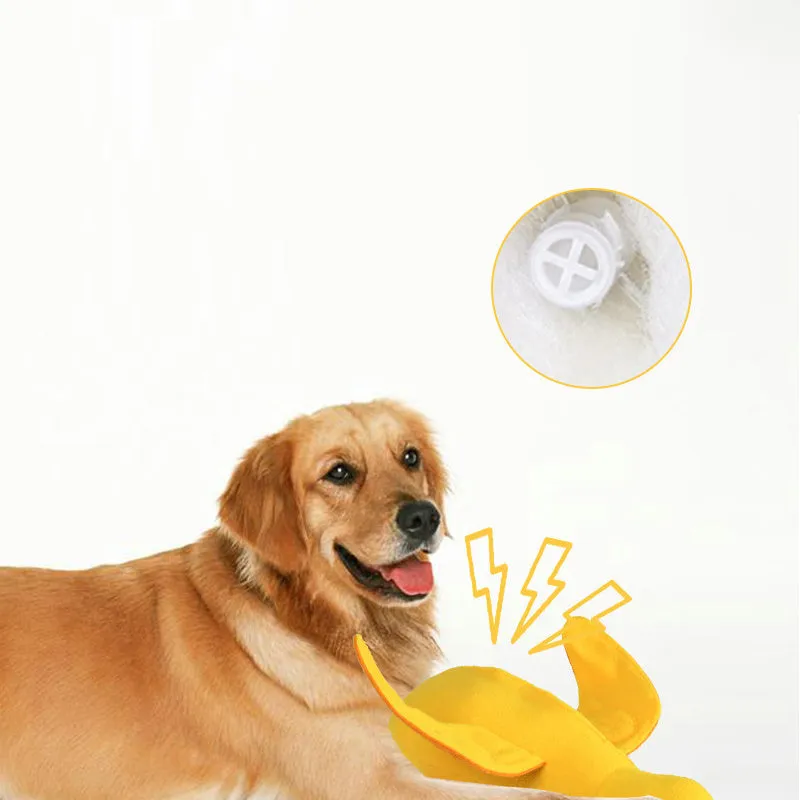 Yellow teddy duck dog toy with squeaker and treat compartment for training and dental care