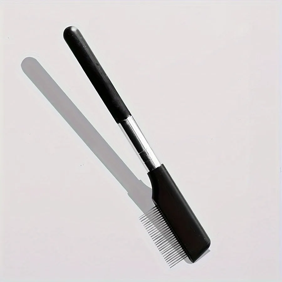 Black ambidextrous pet grooming brush with soft bristles for tear stains and a comb end for hair removal.