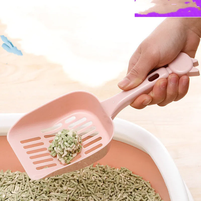 Thickened PP resin cat litter shovel 25cm long 9cm wide with large hole strip design
