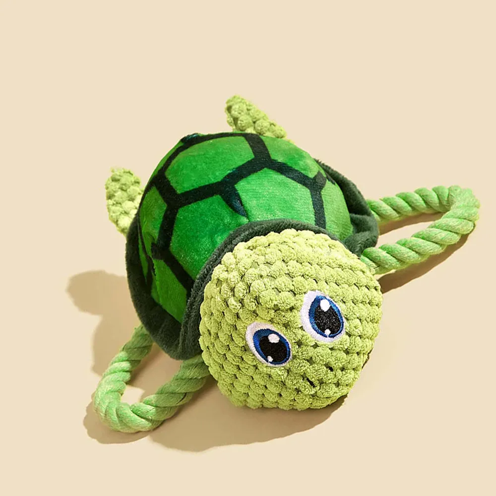 Grey turtle-shaped dog chew toy made with knotted rope and soft stuffing.