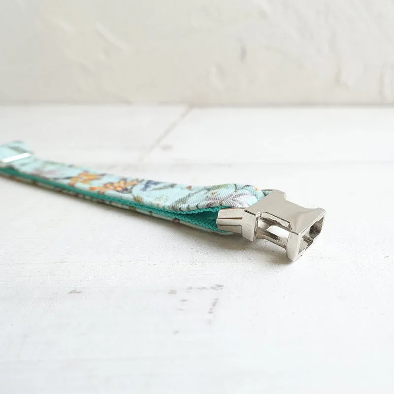 Green adjustable pet collar made from cloth and webbing suitable for dogs and cats with two sizes S and L