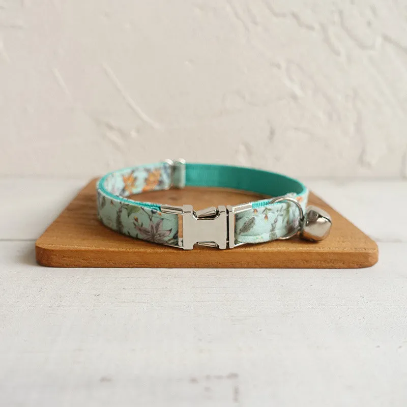 Green adjustable pet collar made from cloth and webbing suitable for dogs and cats with two sizes S and L