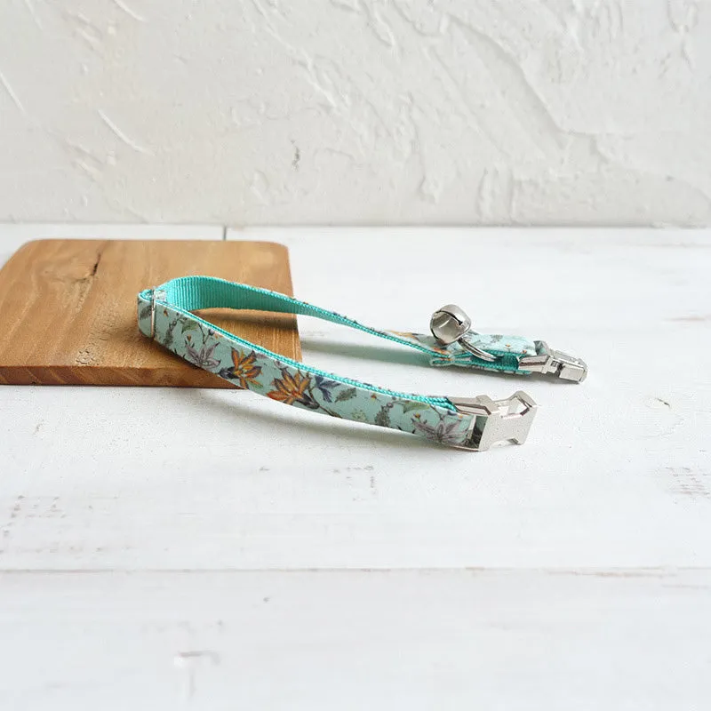 Green adjustable pet collar made from cloth and webbing suitable for dogs and cats with two sizes S and L