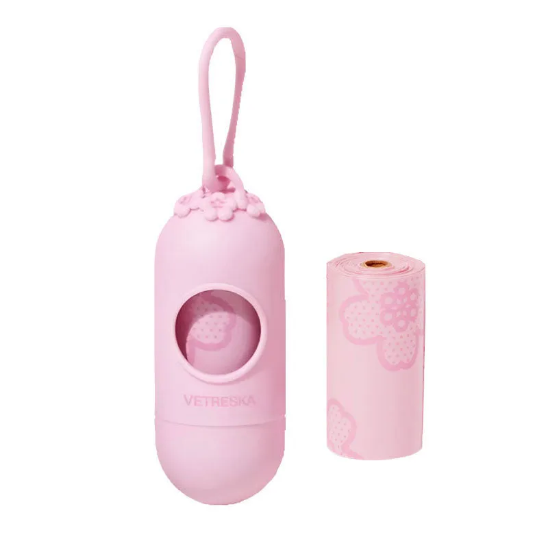 Portable dog poop bag capsule with scented inner bags in strawberry, orange, and cherry blossom styles.