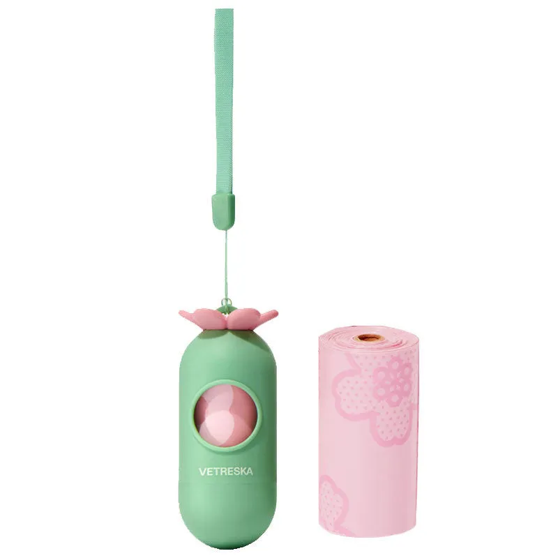 Portable dog poop bag capsule with scented inner bags in strawberry, orange, and cherry blossom styles.