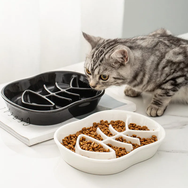 Ceramic shallow cat bowl in black on a light background, showing wide lip and low profile for whisker comfort