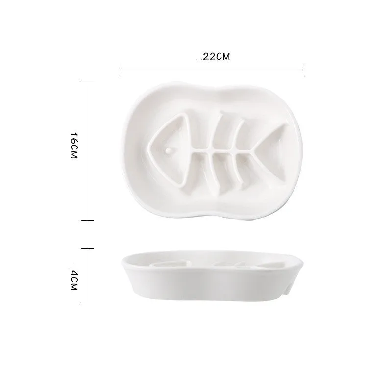 Ceramic shallow cat bowl in black on a light background, showing wide lip and low profile for whisker comfort