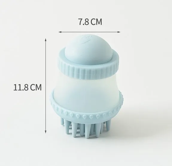 Multifunctional TPR pet bathing brush in pink, 11.8x7.8cm, with silicone bristles for dog and cat grooming