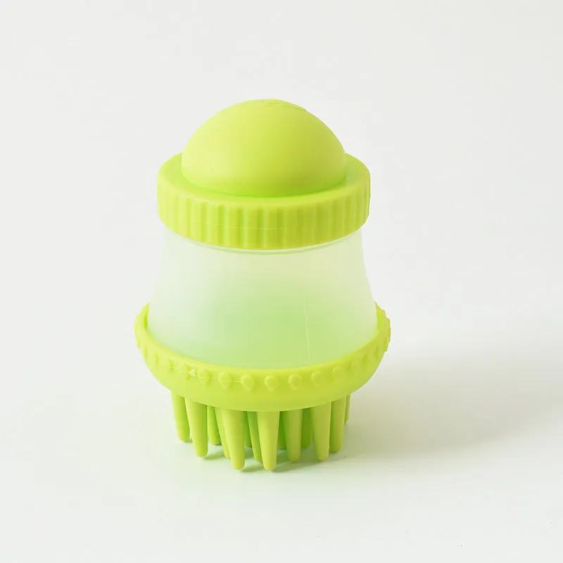 Multifunctional TPR pet bathing brush in pink, 11.8x7.8cm, with silicone bristles for dog and cat grooming