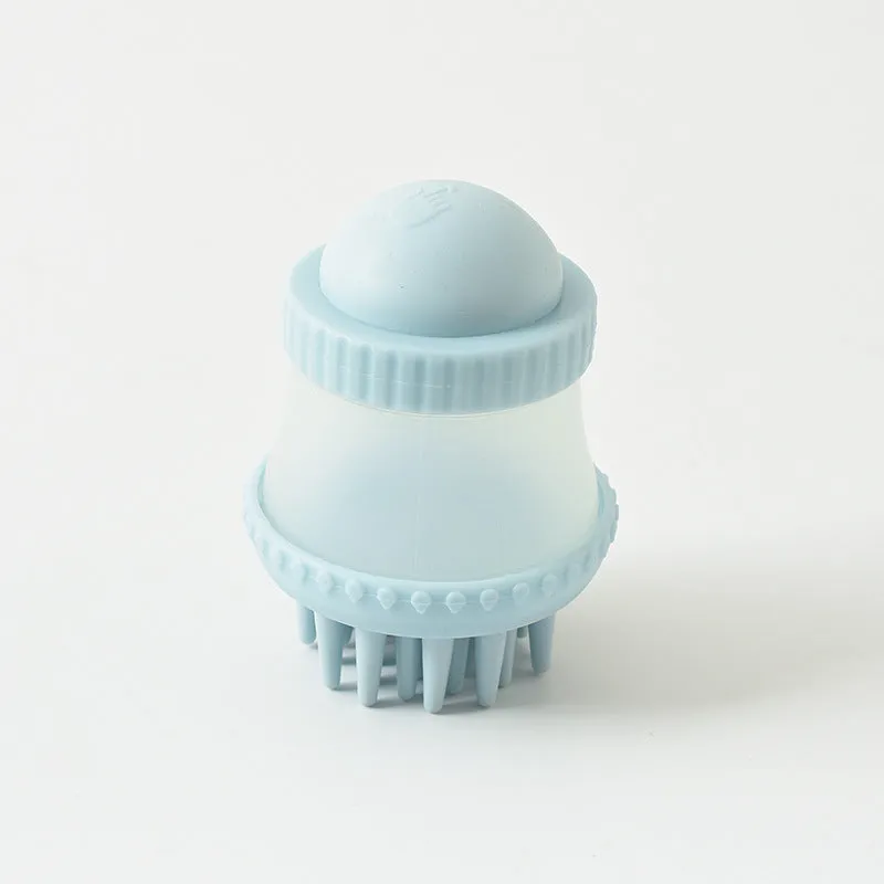 Multifunctional TPR pet bathing brush in pink, 11.8x7.8cm, with silicone bristles for dog and cat grooming